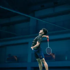 Reaching for the top. A young player executes a high jump smash, demonstrating the advanced techniques taught in our AWSB training programs.