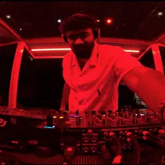 A point-of-view shot from behind the decks at Sunburn Union, Bangalore. This is the immersive, high-intensity environment I create in top nightclubs, keeping the dance floor packed with a mix of Techno and House music.