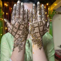 A lovely floral net pattern with a beautiful mature stain. The color will be darkest on the palms and slightly lighter on the arms.