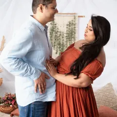 A fun, candid moment between the couple during their boho-themed session. We love capturing these playful interactions.