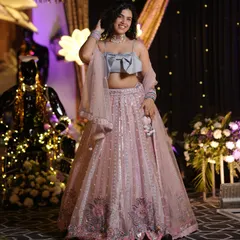 A full view of this dreamy pastel lehenga. Notice how the intricate embroidery and sequin work catch the light. I focus on finding pieces with beautiful details that make you feel like you’re wearing a work of art.