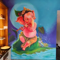 The completed 'Venu Ganapa' wall mural situated in a client's home. This image shows how a custom spiritual painting can integrate beautifully with interior design, transforming a simple wall into a divine space.