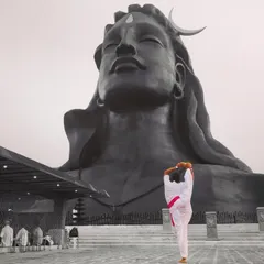 Performing an advanced standing split in front of the Adiyogi statue. To be a yogi is to breach the boundaries of the physical and experience a union with everything. This place is a powerful reminder of that goal.