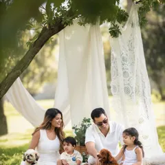 Laughter, sunshine, and puppy love. This candid shot shows just how much joy pets bring to a family dynamic, and I love capturing that energy.
