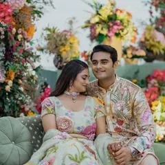 An intimate portrait of Shree and Mohnish. This photo showcases how their coordinated Rahul Mishra ensembles work beautifully together up close.