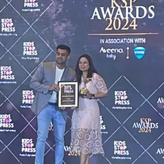 Receiving the award for Best Family Photographer on stage. This milestone is extra special as I enter my own 10th year of Priya Chhabra Photography.