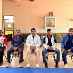 With my fellow coaches and associates. A strong team is necessary to guide and mentor our students effectively.