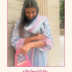 Eshita looking cute and chic in one of my printed kurta sets, paired perfectly with a pink bag. I love seeing your unique styling. #MulmulAndMe.