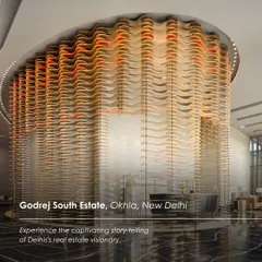 The striking AV zone at the Godrej South Estate Experience Centre in Okhla, New Delhi. This sculptural, wave-like installation creates an immersive enclosure, demonstrating how we use architectural forms to guide visitor journeys and create memorable brand narratives.