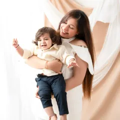 A joyful, candid moment between a mother and her son. I aim to capture the natural interactions and love that define your family's connection.