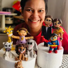 One of my wonderful students showcasing her entire collection of fondant figurines made during the workshop. She created a whole set of jungle animals, a girl, a superhero, and a couple topper, all in just a few days!