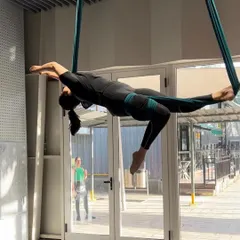 This is what a successful recovery looks like. After rehabilitating a significant neck injury with us, our client is back to performing advanced aerial yoga. Our personalized programs are designed not just to heal, but to help you return to your passions with confidence and strength.