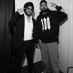 'Standing on Business' with Riar Saab. A black and white shot capturing the serious focus we bring to our performances.
