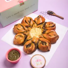My Pesto Cheese Snowflake is a savoury pull-apart bread perfect for any party. It's made with a soft dough, filled with my flavourful homemade pesto and cheese, and baked until golden.