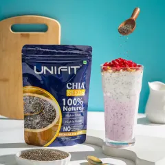 An action shot of chia seeds being sprinkled into a smoothie, with the Unifit packaging displayed prominently.