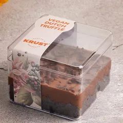 A closer look at the packaging for our Vegan Dutch Truffle. The beautiful label reflects the quality of the delicious plant-based dessert inside.