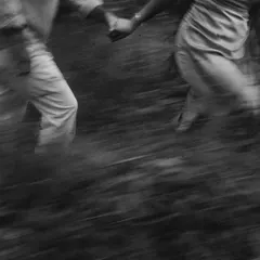 This artistic, motion-blurred shot from a pre-wedding session captures the feeling of running toward a future together. I use techniques like this to convey emotion and movement, turning a simple moment into a piece of visual poetry.