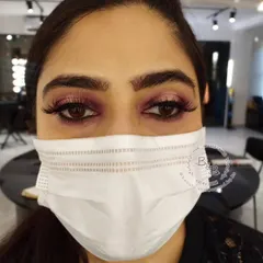 A beautiful pink and gold halo eye look, perfect for any wedding function, day or night. This technique helps the eyes appear larger and adds a shimmering glow and dimension to the face.
