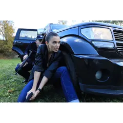 An action sequence featuring Amy Jackson. Her outfit, consisting of a leather jacket and jeans, was chosen to allow for maximum movement while maintaining a sharp, authoritative silhouette.
