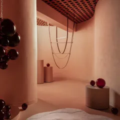 This is a glimpse into the retail store we designed for Prism Lights. Our goal was to create a minimalist, luxurious shell that would let the bespoke lighting fixtures be the true heroes. We used curved forms and a soft, monochromatic peach palette to create a gentle flow and a warm, inviting atmosphere for customers.