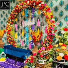 A side view highlighting the explosion of flowers and colors in this Mehndi setup. I used bright floral arrangements in the foreground to add depth to the scene.