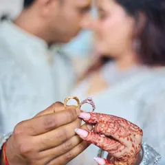 The rings are a symbol of your promise. I love taking a moment to capture this detail, focusing on the rings while keeping the couple's connection softly in the background. It’s a timeless shot that tells a big story.