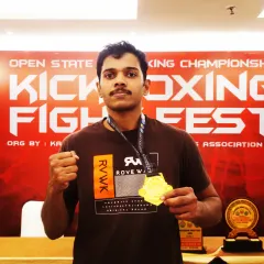 This gold medal from the Karnataka Open Kickboxing Championship was a proud moment. It’s a reminder that with hard work and discipline, any goal is achievable. I bring this same champion mindset to every class I teach.