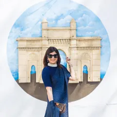 A chic solo portrait of the bride-to-be. Her modern saree and confident pose against the iconic backdrop make for a fashionable shot.