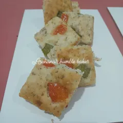 Freshly baked, yeast-free focaccia bread topped with tomatoes and herbs. This Italian-style bread is soft, flavorful, and a wonderful addition to any meal.