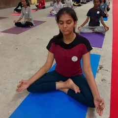 It's a privilege to guide the next generation. This young scholar at the Lila Poonawalla Foundation is in a moment of quiet meditation, learning tools to manage academic pressure and cultivate inner calm.
