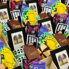 Get your groom squad ready with our "Team Groom" hampers. These fun and practical kits include personalized photo frames, face masks, gourmet snacks, and "The Groom Squad" tags to build excitement for the big day.