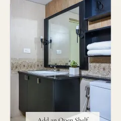 Adding an open shelf above the toilet is a smart hack for gaining storage in a small bathroom. It’s the perfect spot for storing extra towels or adding a touch of green with a small plant.