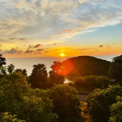 Taking in a breathtaking sunset in Thailand. Travel and experiencing the beauty of the world is a huge part of my life, reminding me to stay present and grateful.