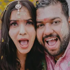 The pure, unscripted fun of a Haldi ceremony. I believe the best photos come from real moments, capturing the playful energy and laughter that make Indian weddings so special.