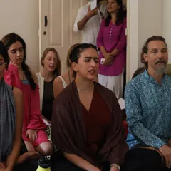A student deep in the experience of a kirtan session. When we chant together, we create a shared field of devotion and high vibrational energy that is deeply healing.