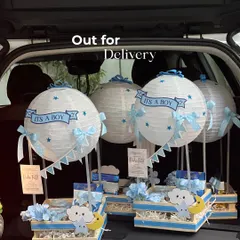 The fleet is ready for delivery! A car full of hot air balloon announcement hampers, ready to be sent out to share the wonderful news.