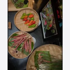 A display of some of the fresh, organic ingredients we use, including fiery Bhut Jolokia (king chillies), long beans, and aromatic ginger and galangal.