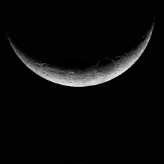 The crescent moon and the planet Venus in conjunction, captured with my Nikon. A beautiful and rare celestial event that showcases my astrophotography skills.