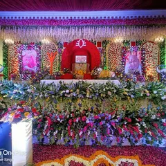 This was a grand Mahashivratri event decoration. The entire stage is a sea of fresh, colorful flowers, with a central gaddi for prabhu, framed by portraits of Guru Ji. I used a mix of roses, marigolds, and carnations to create this vibrant and devotional space.