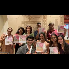 A happy group photo from a workshop where we used edible superfood powders to paint. Always fun to experiment!
