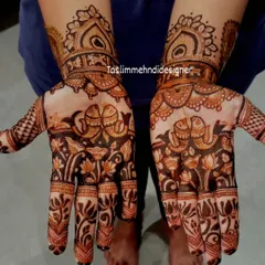 This design features traditional elephant and lotus motifs, which are symbols of prosperity and purity. The use of negative space makes the figures stand out beautifully.