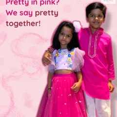 Pretty in pink, and even prettier together. I designed this vibrant pink kurta for him and a floral lehenga for her, showing how you can coordinate colors across different styles for a picture-perfect look.