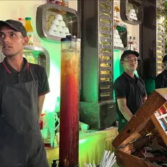 My team of baristas at the coffee counter, ready to craft the perfect cup for your guests.