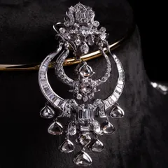 The Celeste Radiance set is for the modern bride who wants impact without heaviness. We designed this with a clean line of mixed diamond cuts, including structured baguettes and soft rounds, finished with fluid drop detailing that moves when you do. It’s sharp, balanced, and unapologetically elegant.