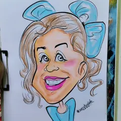 This caricature looks even more beautiful in color. The blue bow and shirt add a lovely touch.