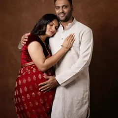 A tender embrace that says everything. Dressed in traditional attire, this couple's portrait is filled with warmth and the promise of the wonderful adventure that lies ahead for them.