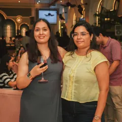 Guests enjoying a corporate evening, forgetting about agendas and simply enjoying the vibe, the food, and the company.