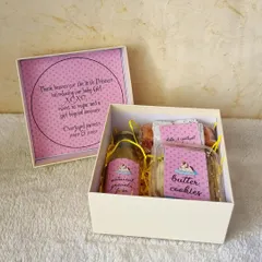 "Thank heaven for the little princess." This personalized baby girl announcement box is filled with our handmade goodies like butter cookies and date & walnut cake.