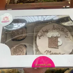 Our bento and cupcake combos are designed to be the perfect surprise. This chocolate set, with its unique beer mug theme, comes neatly packaged in our custom window box.
