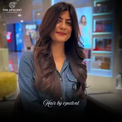 Another angle of this gorgeous hair transformation. The lighting catches the subtle dimensions in her new hair color, showing off its depth.